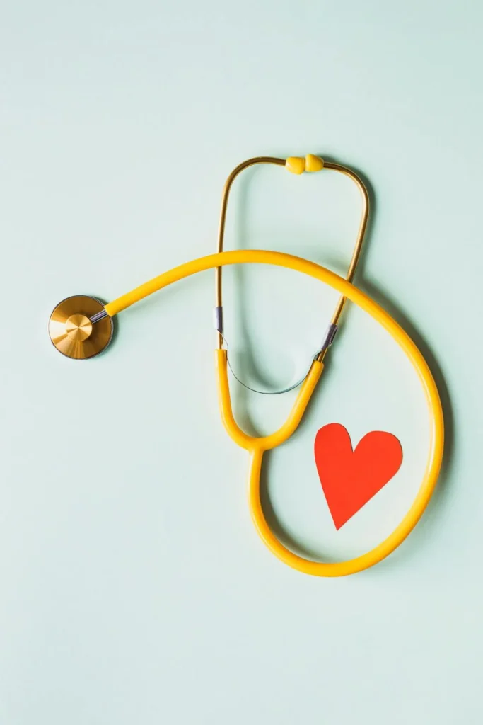 stethoscope and paper heart - heart disease treatment