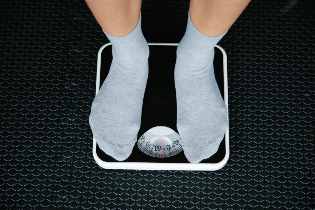 a person's feet on a scale