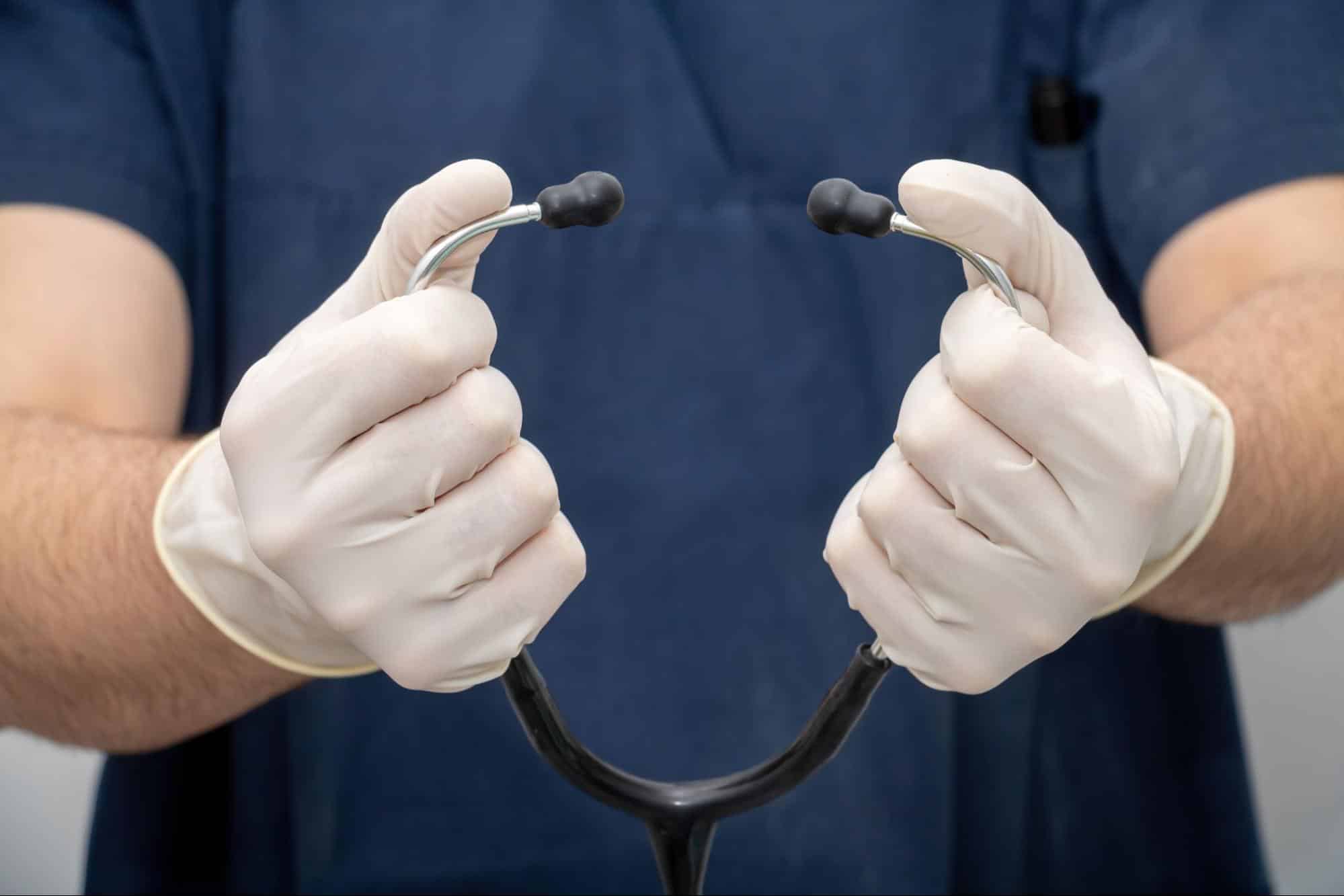 doctor holding stethoscope