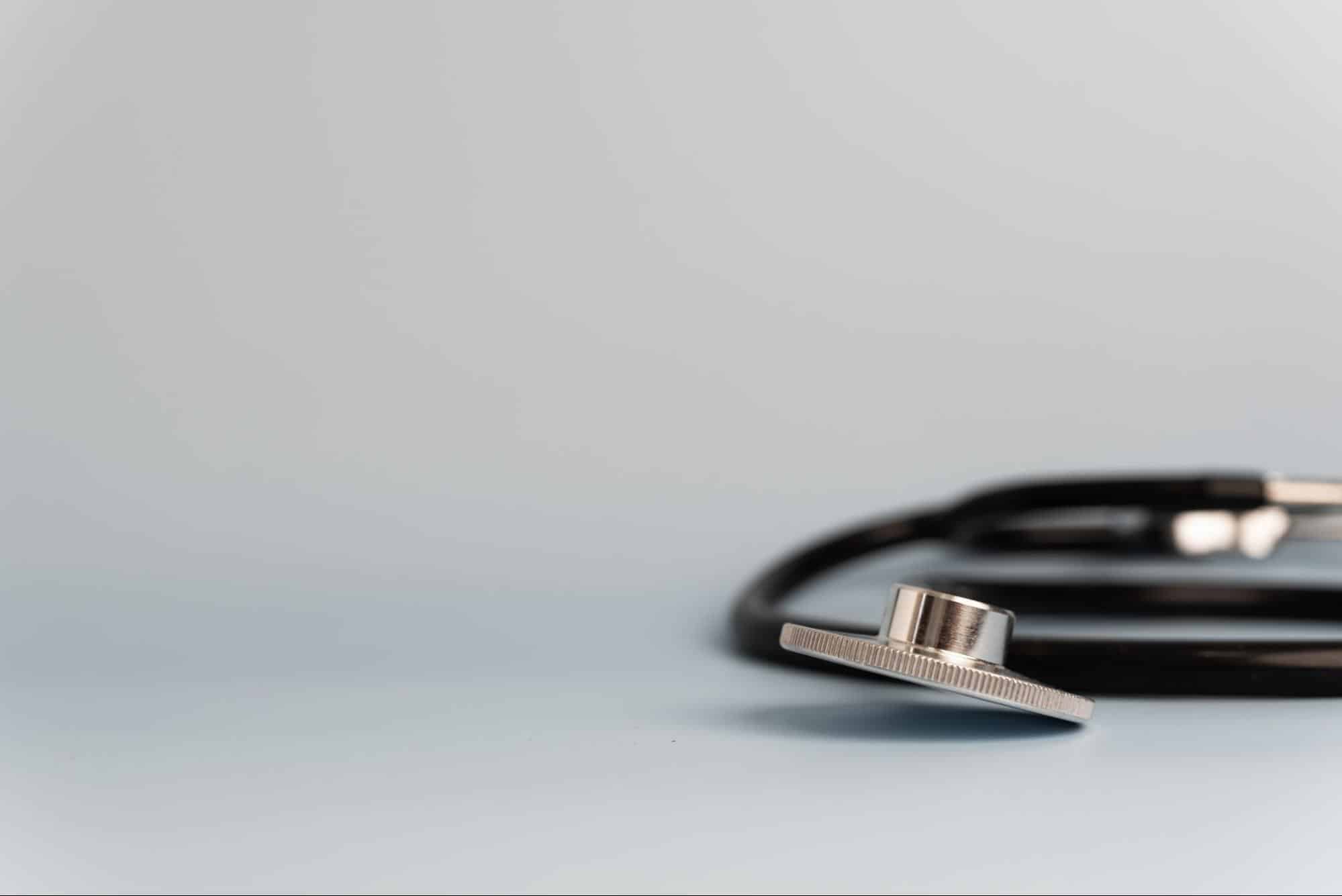 stethoscope on grayish surface