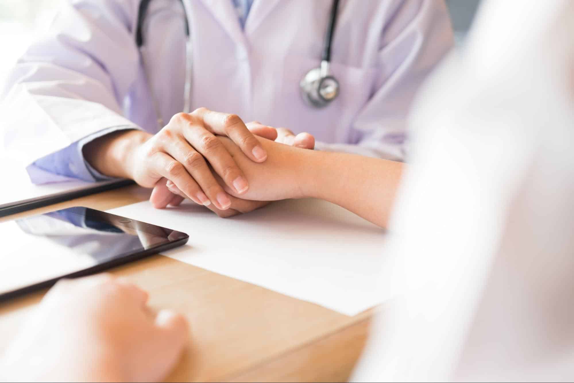 patient listening to a doctor during a consultation