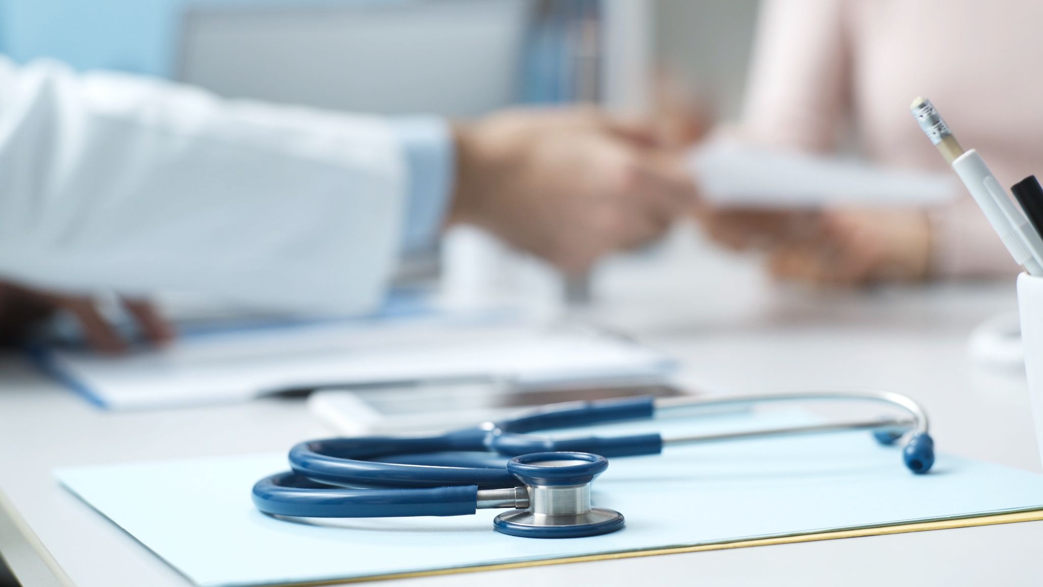 Stethoscope and medical consultation setting representing physician-supervised ketamine treatment and patient monitoring.