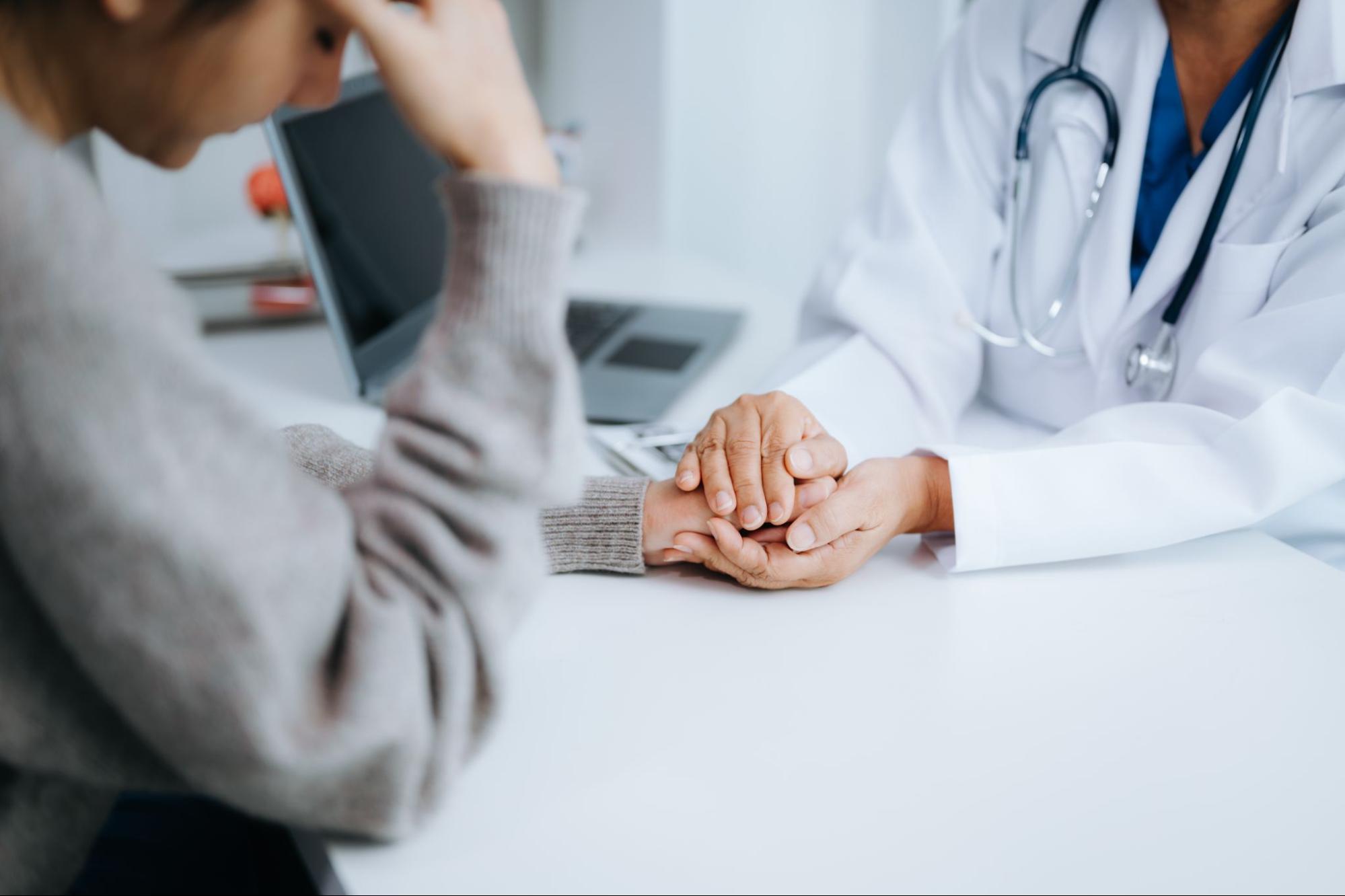Physician offering support to a patient considering ketamine treatment 