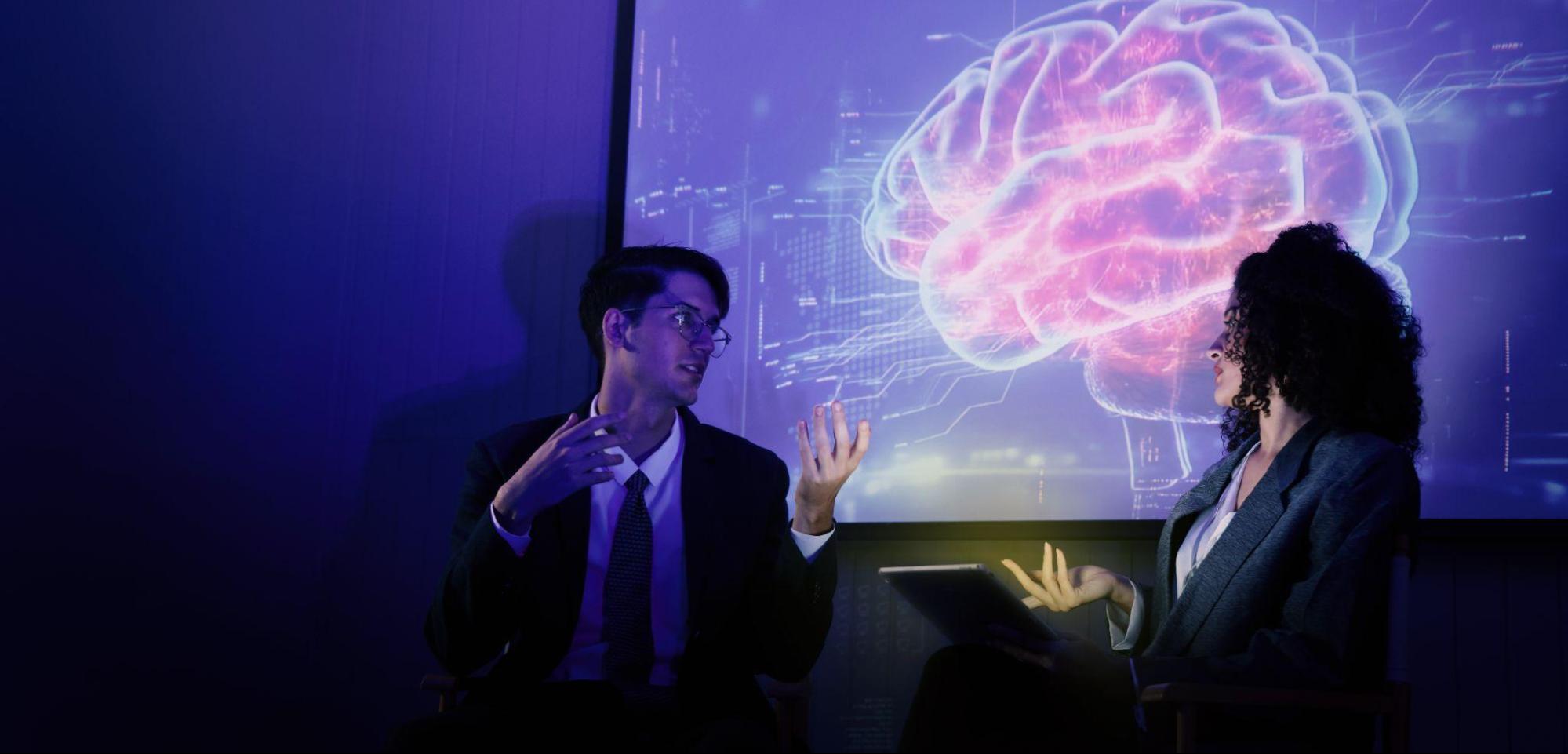 Researchers discussing brain activity and neural signaling related to the ketamine NMDA receptor mechanism. 